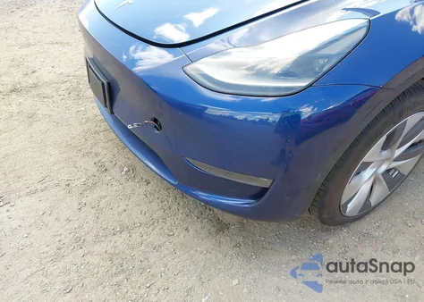 2024 Tesla Model Y Long Range Dual Motor All-Wheel Drive z USA, uszkodzony, nr VIN 7SAYGAEE0RF074822